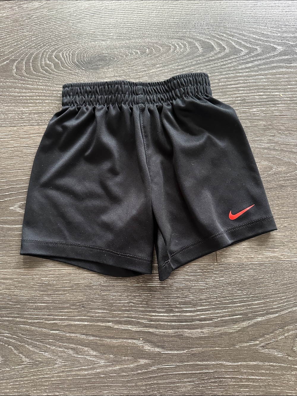 Nike Dri-Fit Kids Black Shorts with Red Swoosh Logo